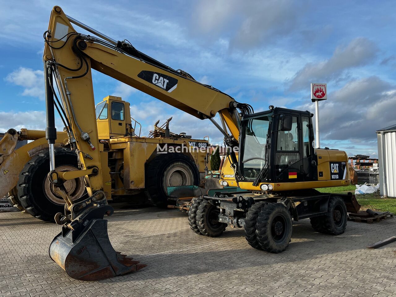 pelle sur pneus Caterpillar CAT M 315D