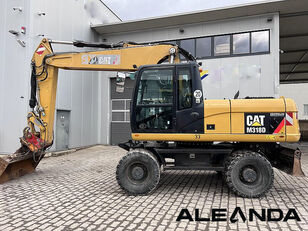 pelle sur pneus Caterpillar M 318 D